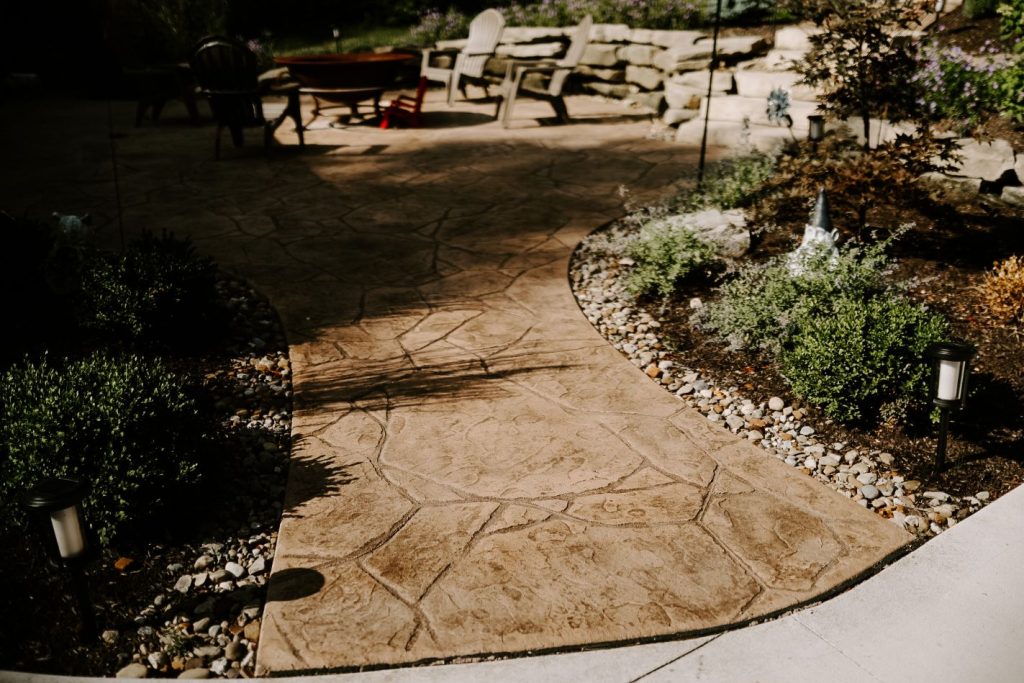 Battig project walkway to patio with firepit