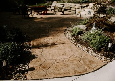 Battig project walkway to patio with firepit